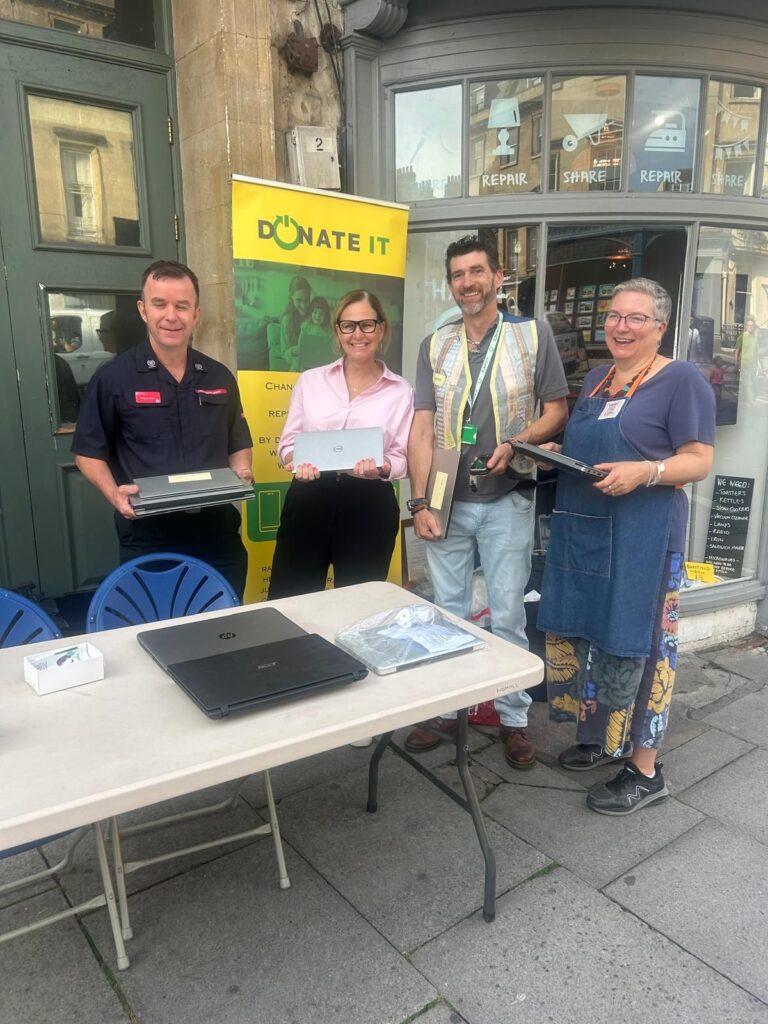 A group of people at the stall smiling