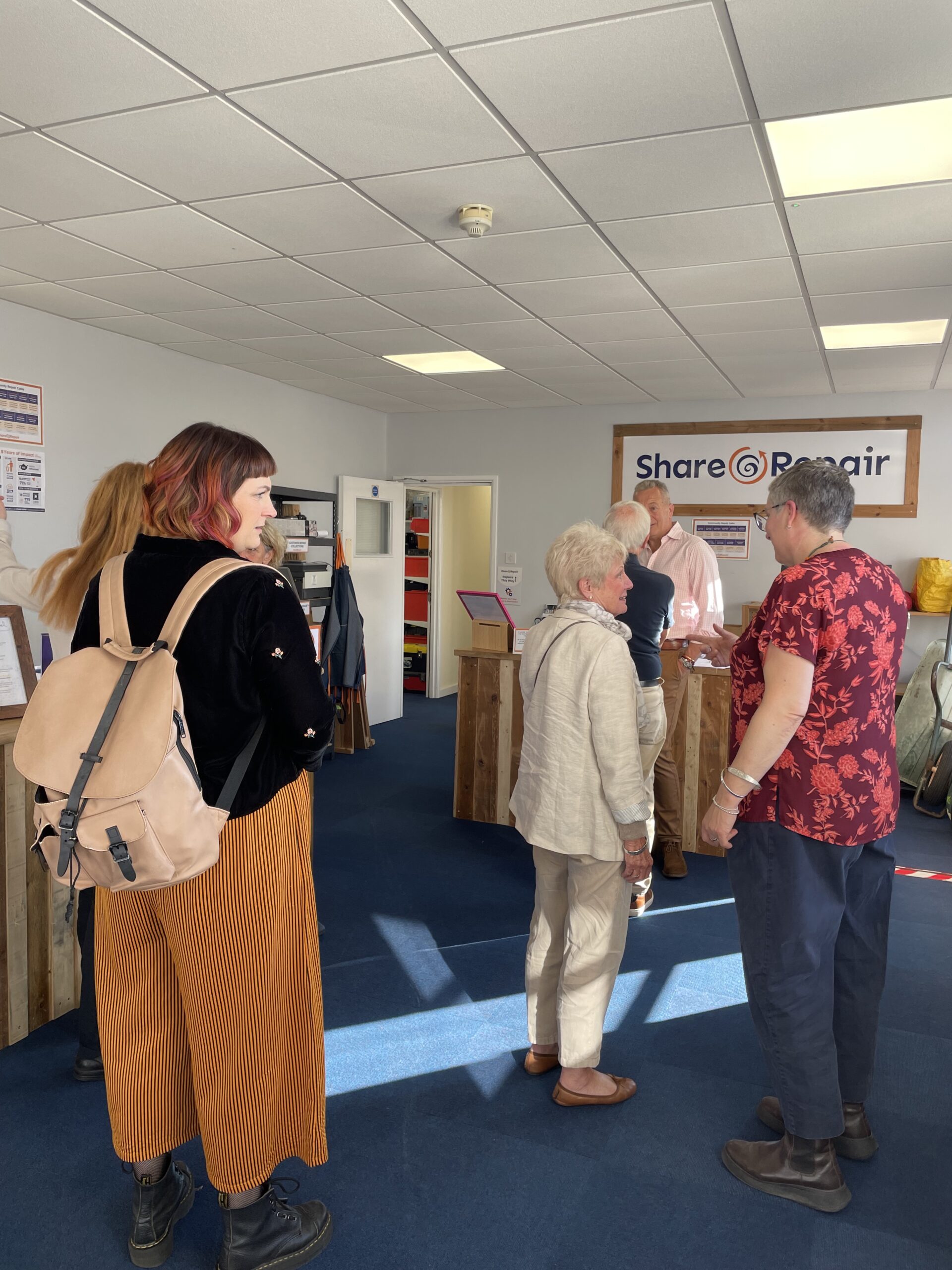 A room of people at Share and Repair's First Event - Open House